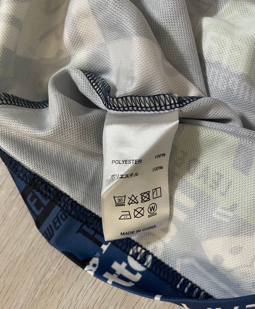 NEW ERA 半袖ミッドネック Tシャツ アーカイブオールオーバーロゴネイビー