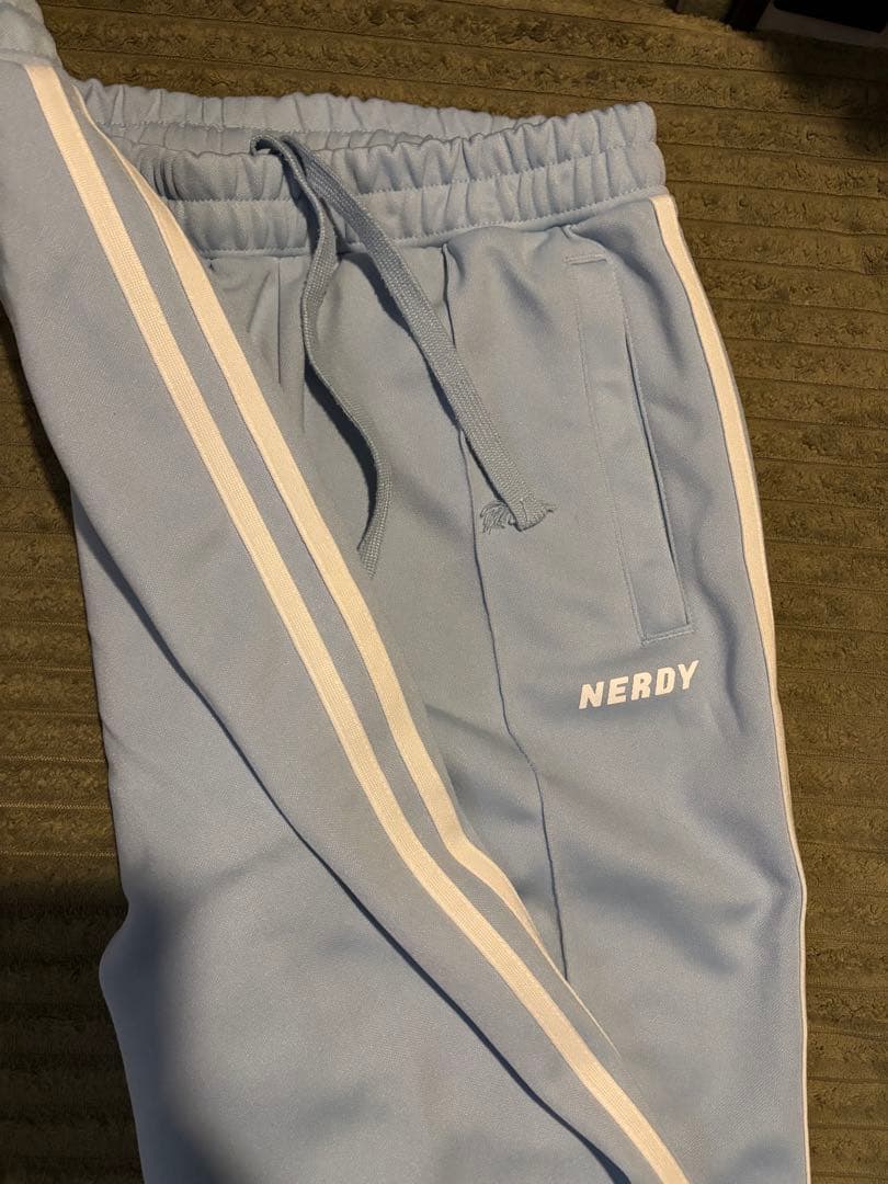 NERDY ライトブルー トレーニングパンツ