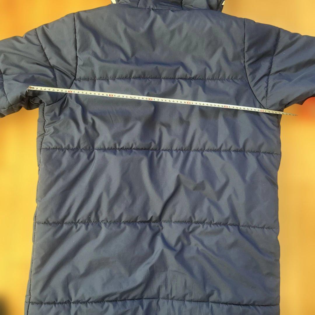 Under Armour フード付きベンチコート ネイビー。中綿ポリエステル