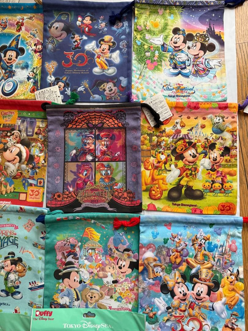 新品タグ付東京ディズニーリゾート巾着14点セット ダッフィーミッキーミニーホテル