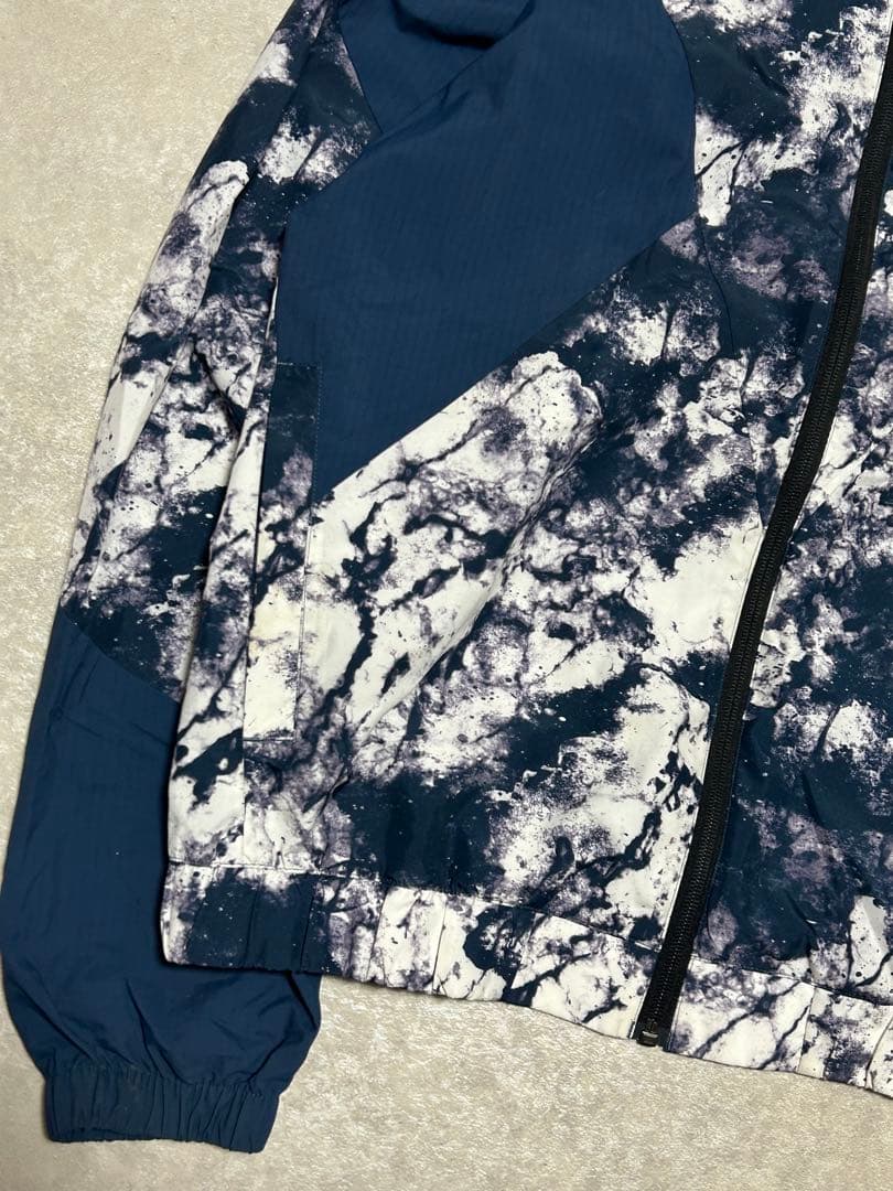 極美品 OAKLEY ENHANCE GRAPHIC WIND L 総柄 メンズ