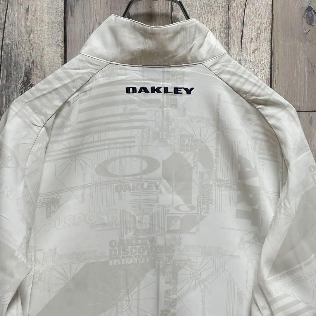 オークリー　OAKLEY ジャケット　ナイロン　総柄　刺繍ロゴ　ホワイト XL