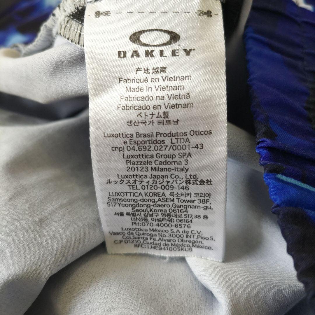 【ほぼ未使用】OAKLEY　STRIKE WIND　セットアップ　L　ブルー