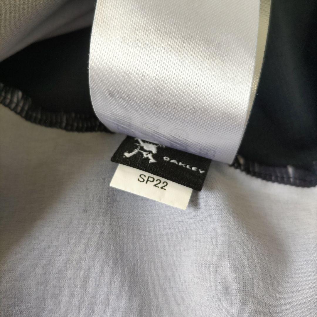 【ほぼ未使用】OAKLEY　STRIKE WIND　セットアップ　L　ブルー