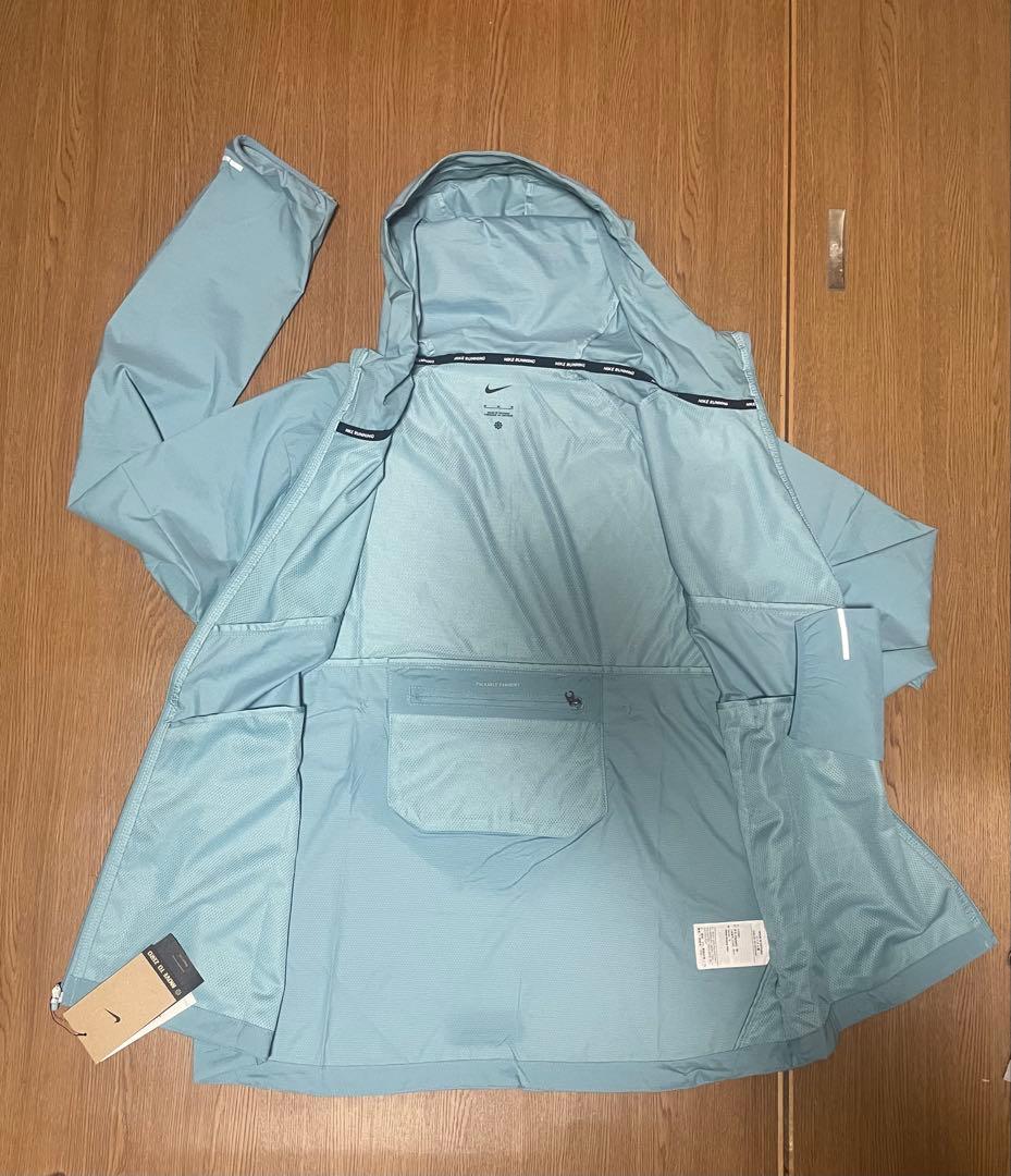 新品2XLサイズ　Nike ライトブルー ウィンドブレーカー