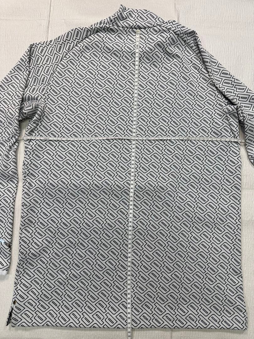 PUMA 幾何学模様ハイネックシャツ 未使用新品(ＸＬサイズ) ホワイト系