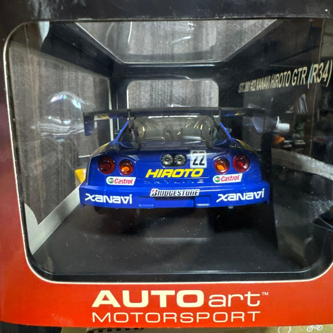 ミニカー AUTOart XANAVI HIROTO GTR (R34) 1/18