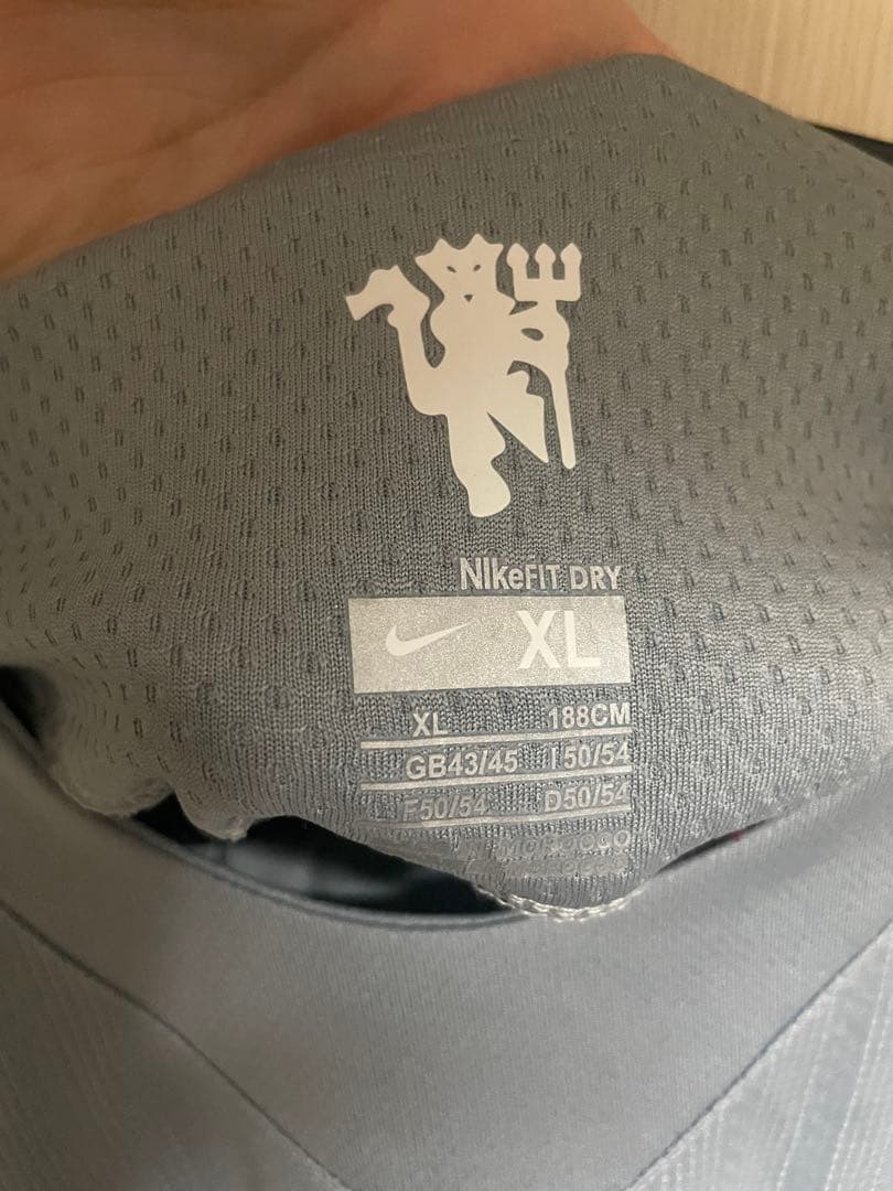 マンチェスターユナイテッド Nike サッカーシャツ 古着 キーパーシャツ 半袖