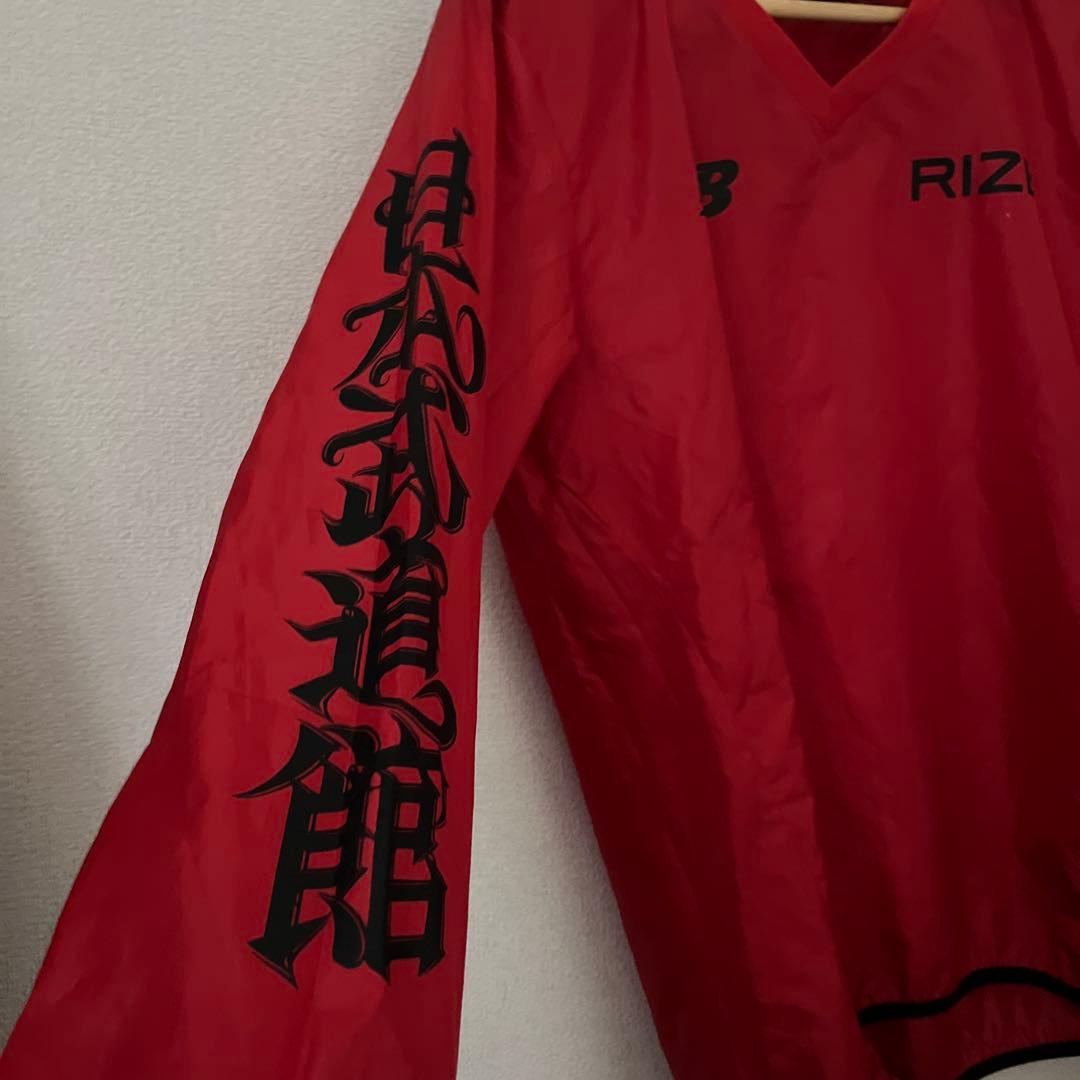 New Balance RIZE ウィンドブレーカー 赤