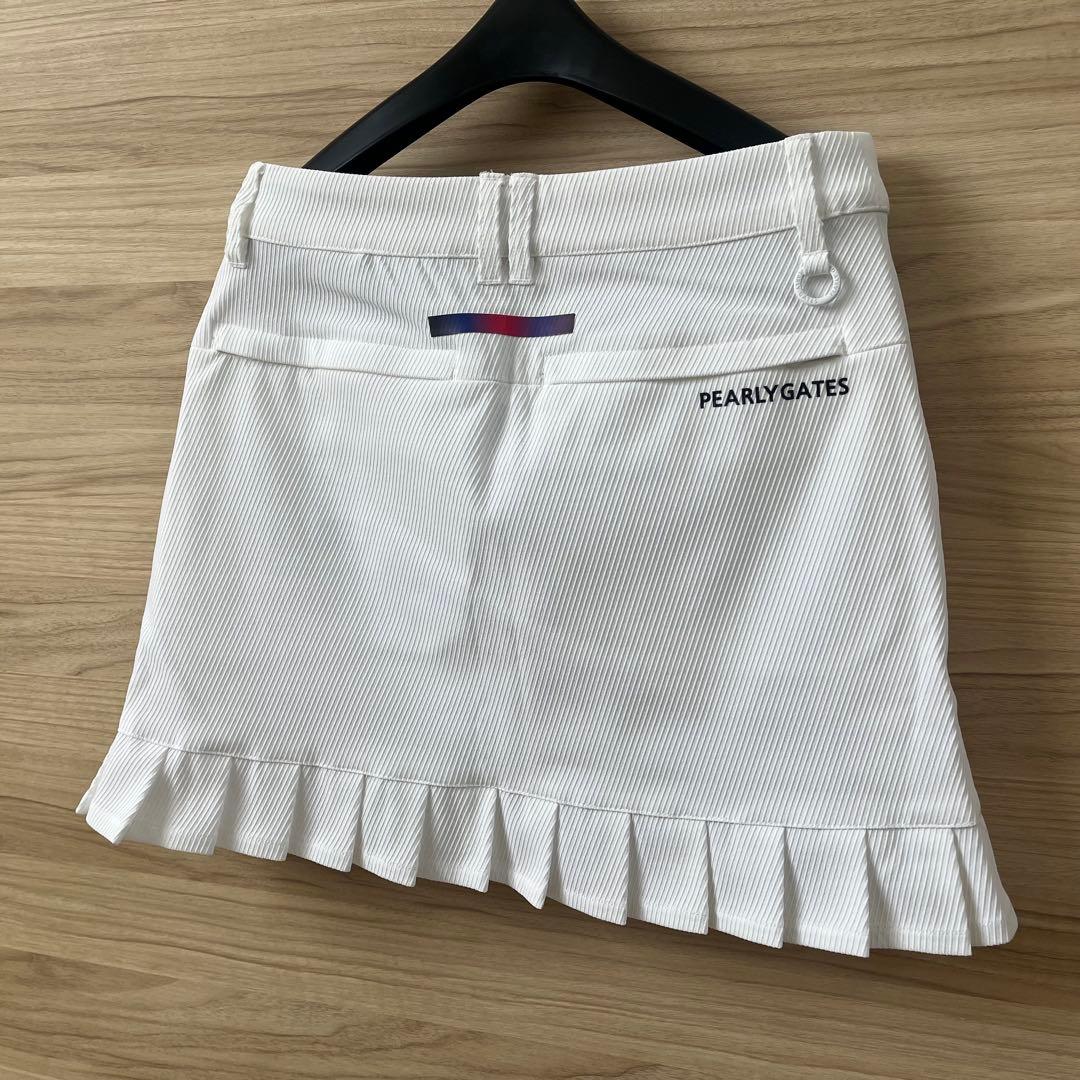 新品★28,600円 パーリーゲイツ 春夏ゴルフスカート 裾プリーズ 濃紺×白０