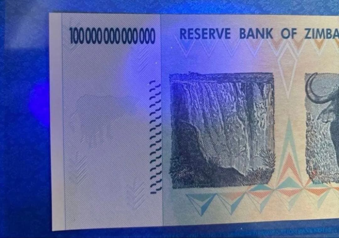 【保証書付き】5 枚連番　ジンバブエ 100兆ドル札 UVチェック済み